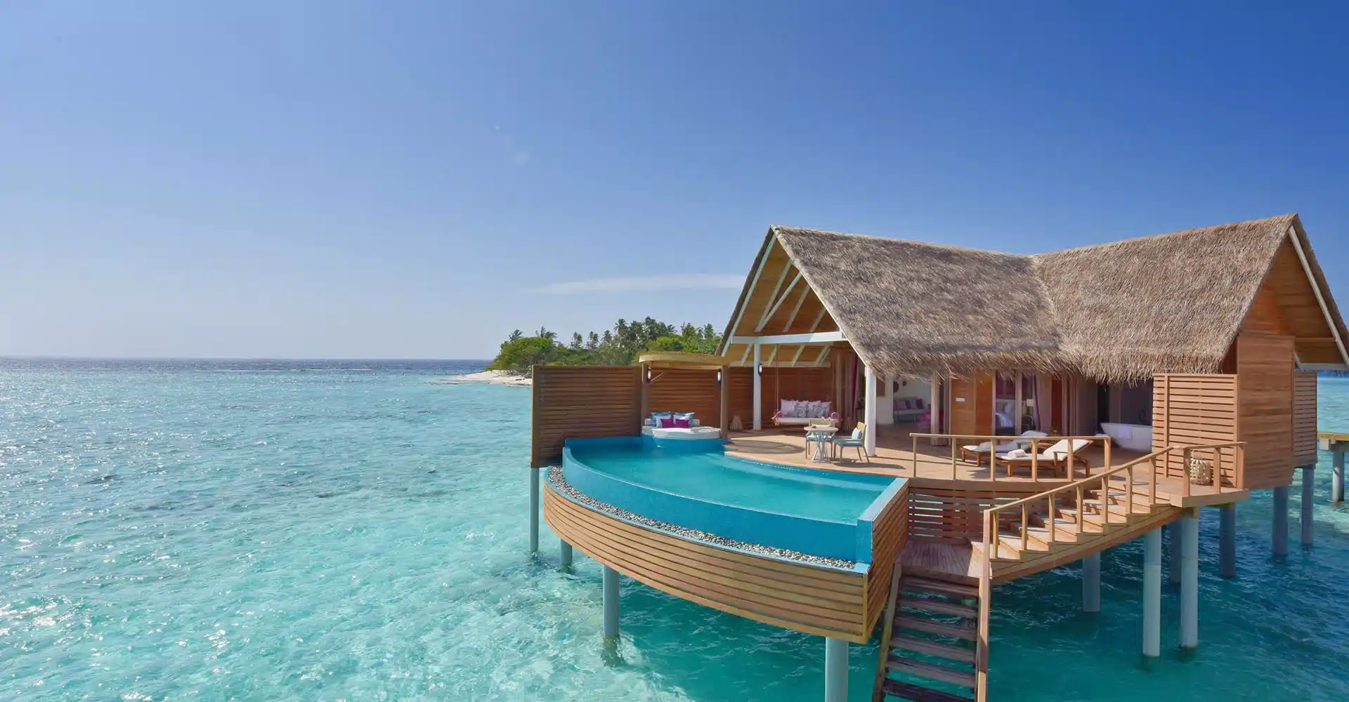 Milaidhoo_Maldives_Water_Pool_Villa_Exterior special for Maldives honeymoon packages from IMAD Travel