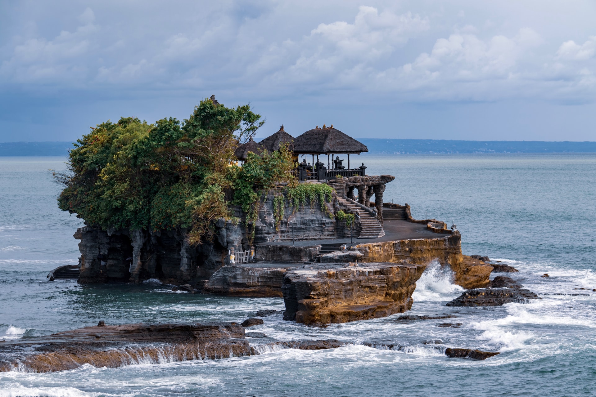 5th Day: : Inter Hotel Transfer + Tanah Lot Temple(Vehicle at Disposal Max 12 Hours)