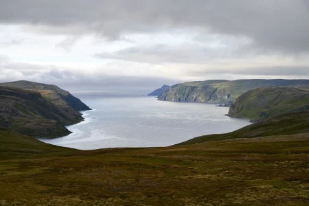 Breathtaking aerial view of Nordkapp cliffs in 14 Days Midnight Sun, Fjords & Swedish Lapland with IMAD Travel