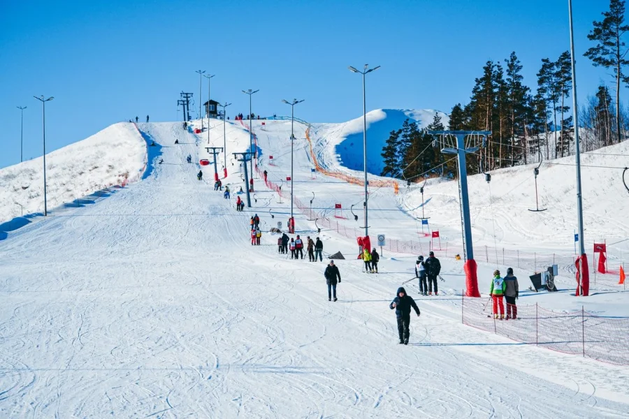 Winter Lapland: 5 Days in Rovaniemi & Levi with IMAD Travel - Levi - skiing and snowboarding at a bustling ski resort