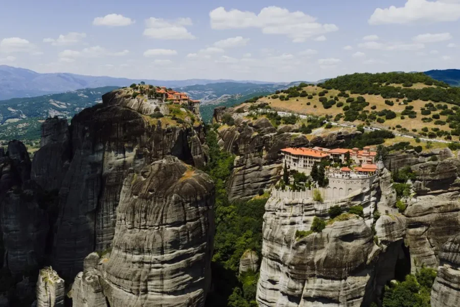 Stunning aerial shot of Meteora monasteries, Greece in 7 Days Greece Package with IMAD Travel